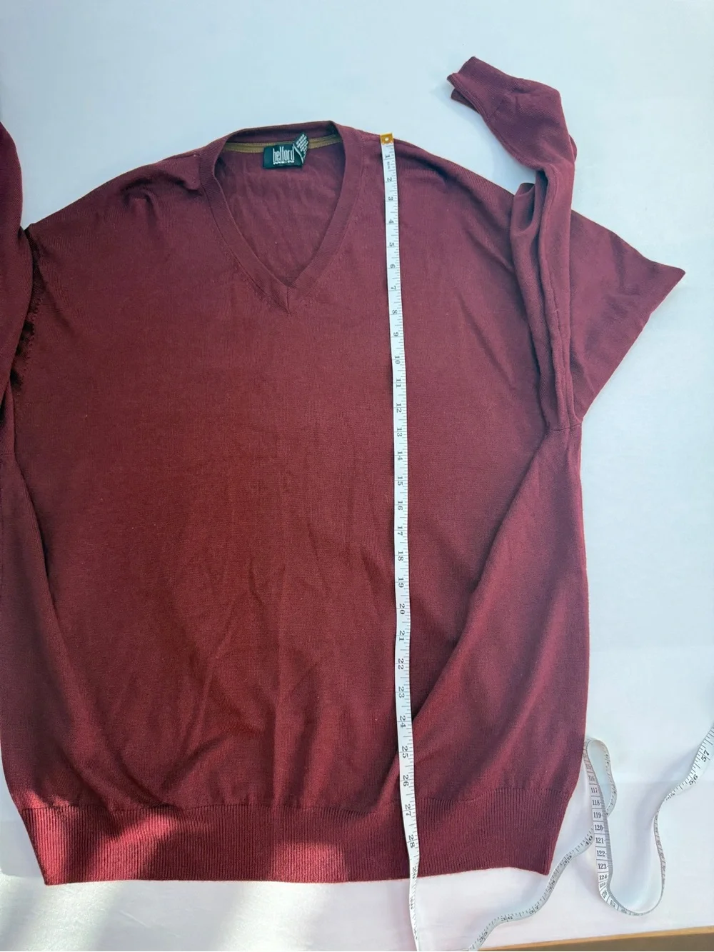 Men's V-Neck Sweater in Burgundy by Belford. Made of extra fine Merino Wool.